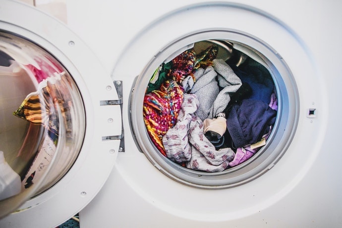 每次只放入洗衣機約七分滿的衣物量
